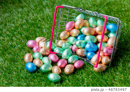 color Chocolate Easter eggs in a meta supermarket basket color Chocolate Easter eggs in a meta supermarket basket 48783497