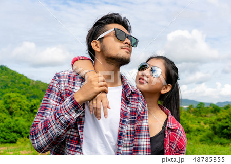 Happy couple take a romantic walk on the hills. Happy couple take a romantic walk on the hills. 48785355
