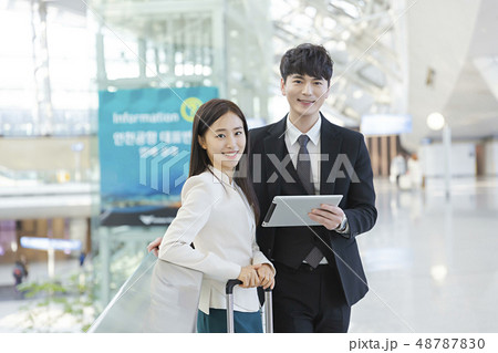 Business trip concept, Business couple at the airport 349 48787830