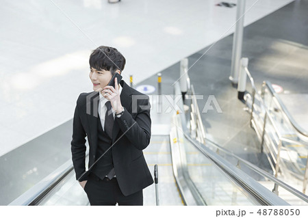 Business trip concept, Business couple at the airport 098 48788050