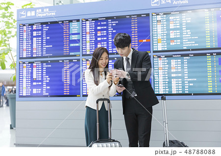 Business trip concept, Business couple at the airport 077 48788088