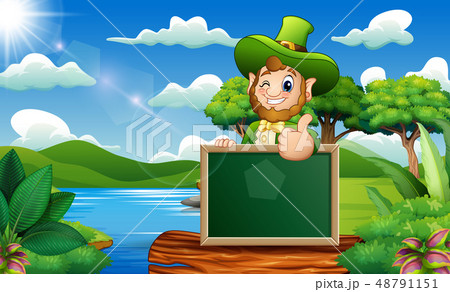 Leprechaun giving thumbs up with chalkboard sign 48791151