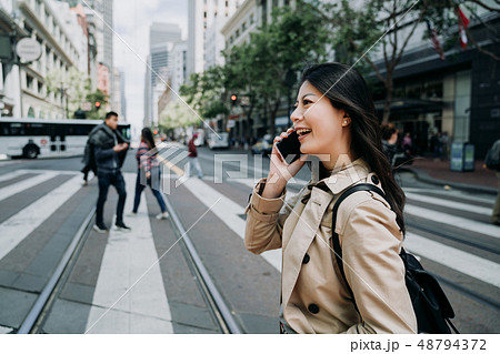 happy asian woman worker talking on cellphone 48794372