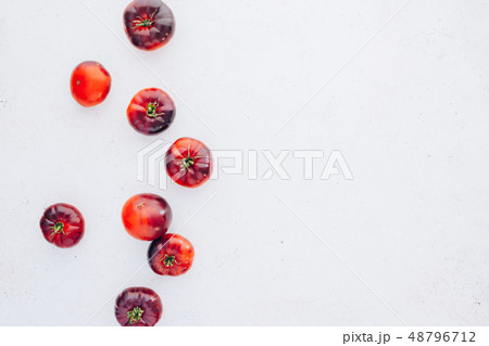 Tomatoes Mar Azul on white wooden table background 48796712