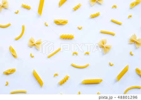 Different types of dry pasta on white. Different types of dry pasta on white. 48801296