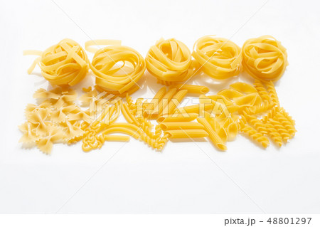 Different types of dry pasta on white. Different types of dry pasta on white. 48801297