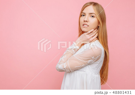 Portrait of a cute beautiful girl in white dress 48801431