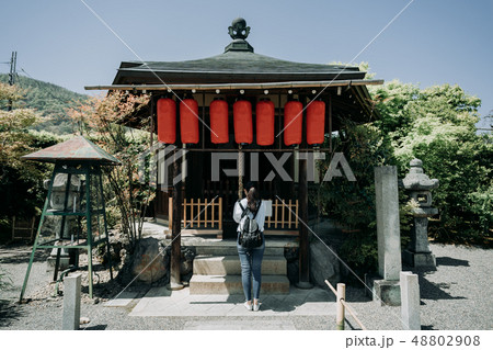 asian girl backpacker praying at the shrine asian girl backpacker praying at the shrine 48802908
