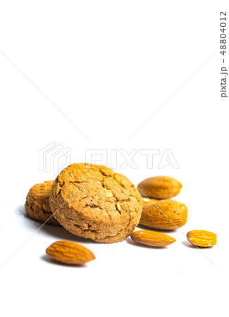 Integral cookies with almonds isolated on white Integral cookies with almonds isolated on white 48804012