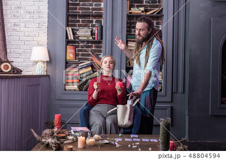 Smart sly man taking out the purse 48804594