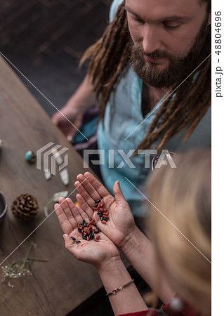 Top view of female hands with special seeds in them 48804696