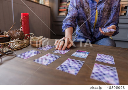 Close up of tarot cards lying on the table Close up of tarot cards lying on the table 48806098