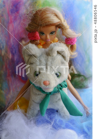 Blonde doll-teenager with dog miniature 48806546