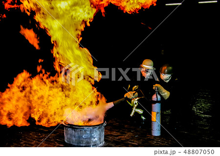 Firefighters training for fire fighting. 48807050