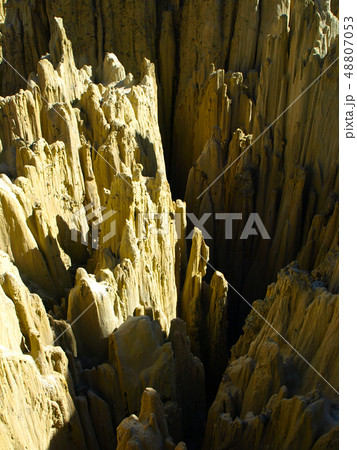Sharp rock pillars in bolivian Moon Valley 48807053