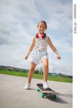happy little girl with long hair happy little girl with long hair 48808082