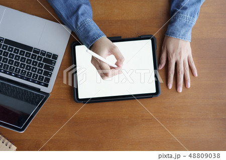Top view hand of asian women are using tablet Top view hand of asian women are using tablet 48809038