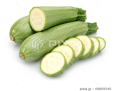 Green zucchini with slices isolated on white 48809540