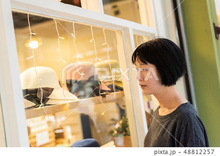 woman look into the store 48812257