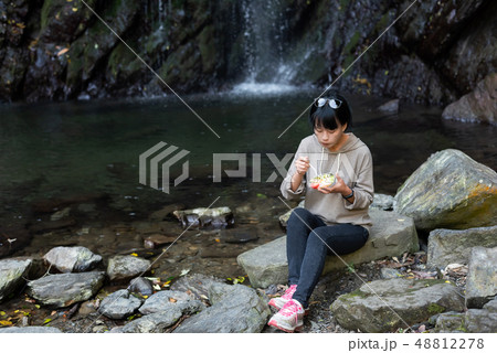 Asian woman eat salad 48812278