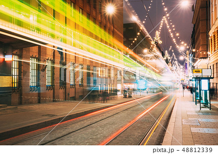 Helsinki, Finland. Tram Departs In Motion Blur From Stop On Aleksanterinkatu Street In Kluuvi Helsinki, Finland. Tram Departs In Motion Blur From Stop On Aleksanterinkatu Street In Kluuvi 48812339