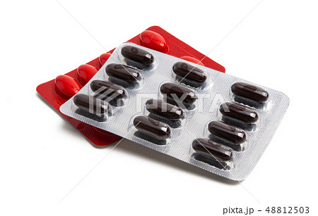 medical capsules in pack isolated 48812503