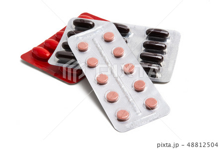 medical capsules in pack isolated 48812504