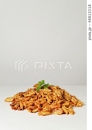 mixed pasta with tomato sauce 48813318