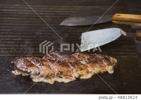 chef cooking beef steak, Teppanyaki in restaurant, chef cooking beef steak, Teppanyaki in restaurant, 48813624