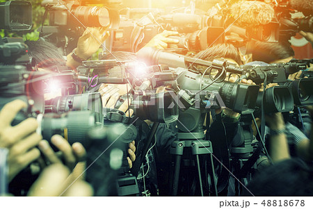 large number of press and media reporter in 48818678