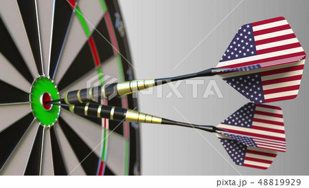 American national achievement. Flags of the United States on darts hitting bullseye. Conceptual 3D 48819929