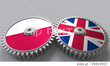 Flags of Poland and The United Kingdom on meshing gears. International cooperation conceptual 3D 48820907