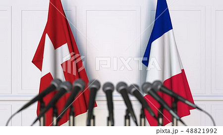 Flags of Switzerland and France at international meeting or conference. 3D rendering Flags of Switzerland and France at international meeting or conference. 3D rendering 48821992