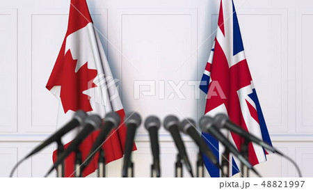 Flags of Canada and The United Kingdom at international meeting or conference. 3D rendering 48821997