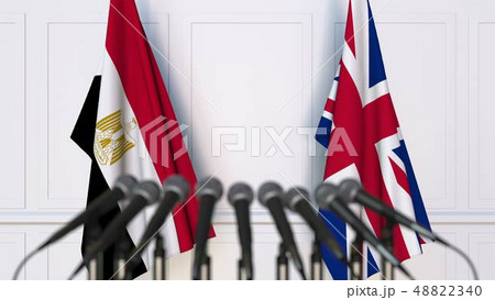 Flags of Egypt and The United Kingdom at international meeting or conference. 3D rendering Flags of Egypt and The United Kingdom at international meeting or conference. 3D rendering 48822340