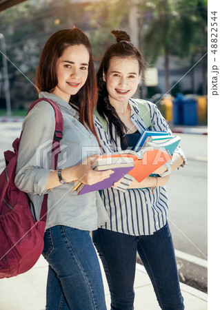 Teenage student in university. 48822544