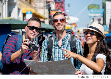 Group of tourist backpacker friends traveling in Group of tourist backpacker friends traveling in 48825891