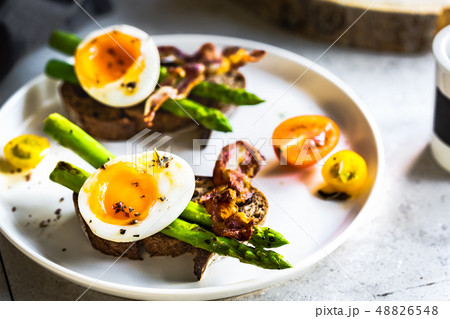 Bacon ,Seared Aspargus and Soft boiled egg on Rye Bacon ,Seared Aspargus and Soft boiled egg on Rye 48826548