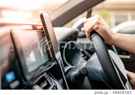 Driver using mobile app for GPS navigation 48826582