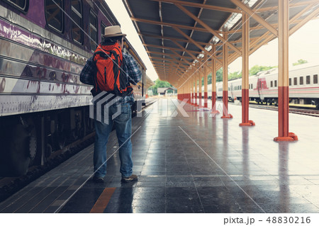 Asian traveler man with belongings 48830216
