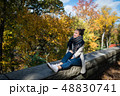 Young smiling woman resting in New York city, USA. 48830741