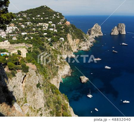 Capri island, panoramic view with Faraglioni Capri island, panoramic view with Faraglioni 48832040
