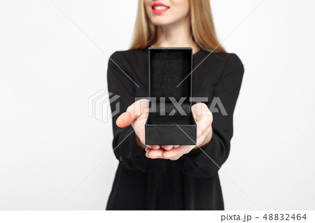 Chic girl in black dress and with red lips Chic girl in black dress and with red lips 48832464