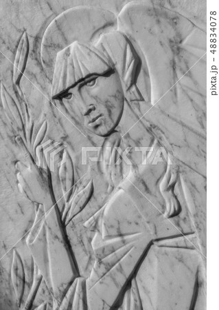 Bas-relief of a woman Bas-relief of a woman 48834078