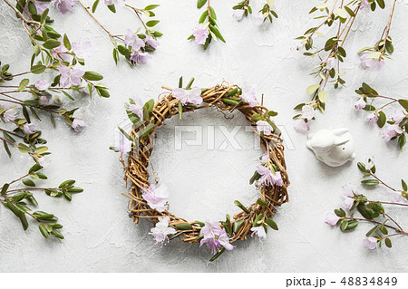 Spring wreath with flowers. Creative flat lay. View from above. 48834849