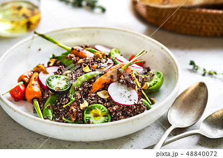 Quinoa with Grilled Baby Carrot and Pea Salad 48840072