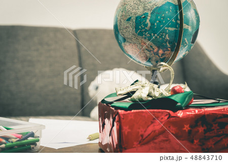 present box and map Globe for holidays travel concept present box and map Globe for holidays travel concept 48843710