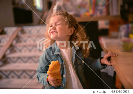 Emotional girl pressing lips while going to cry Emotional girl pressing lips while going to cry 48846002