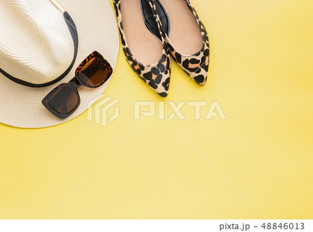 Straw hat, sunglasses and shoes 48846013