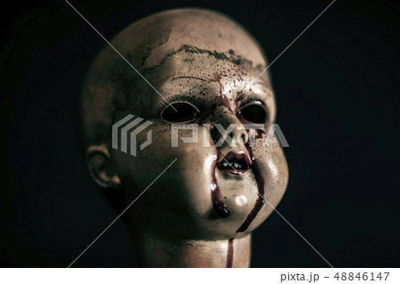 Creepy bloody doll in the dark  48846147